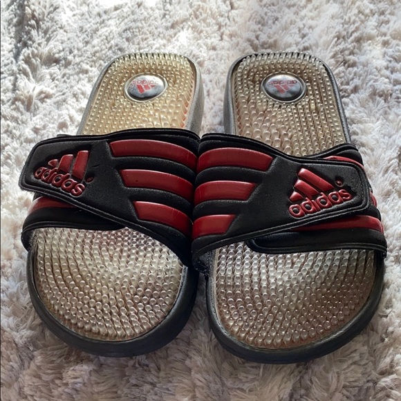 red and black adidas slides